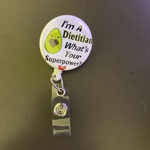Badge holder with retracting cord!